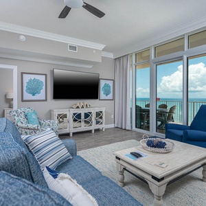 Relax in the cozy seating while taking in views of the coast through expansive windows