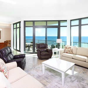 Savor the calming vibes in the inviting living area, perfect for family games and quality time together