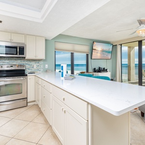 Craft delicious meals in this elegant kitchen with stainless appliances and a stylish backsplash