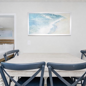 Gather around the table, sharing laughter and stories as you savor easygoing moments in this welcoming space