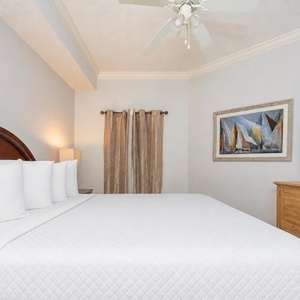 Drift into comfort on the king bed in the master, snuggling into fluffy bedding with your favorite show for a restful night