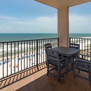 Enjoy meals or drinks at the outdoor table while taking in the sweeping views of the coastline and waves