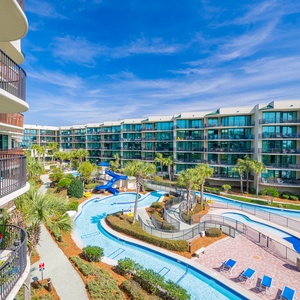 Discover the pool area with a refreshing lazy river and thrilling waterslide, just steps from the bay