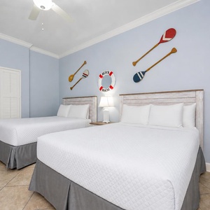Relax in this cozy guest suite with two queens and drift off in peaceful slumber