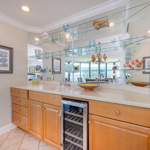 Grab a chilled bottle from the wine cooler or create your favorite cocktail at the wet bar