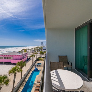 Look out over the sparkling coast from your balcony as gentle waves meet the shore below