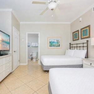 Rest comfortably on plush double beds as you settle in for a cozy movie night with family in the guest suite