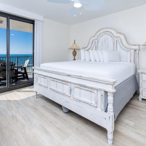 Retreat to this elegant master suite on the beach with a king bed and direct balcony access