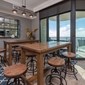 Gather in this rustic dining space with family, sharing stories and laughter while enjoying the stunning views