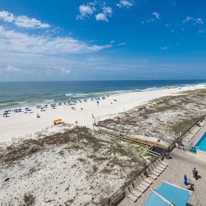 Take in the beautiful coastline views while relaxing by the poolside, just steps from the beach