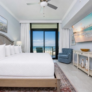Unwind after a day at the beach in this king master suite with your favorite show and the sound of the waves