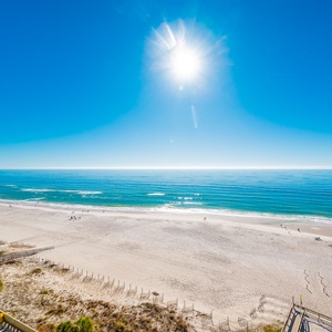 Gaze at the breathtaking coast from your balcony, soaking in the sun and sounds of the waves rolling ashore