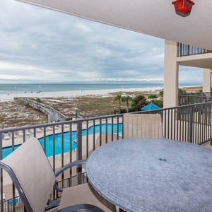 Enjoy your morning coffee on your beachfront balcony while taking in views of the pool and the coastline