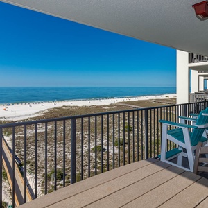 Balcony seating offers a serene view of the tranquil gulf and white sand beach, perfect for relaxation and enjoyment