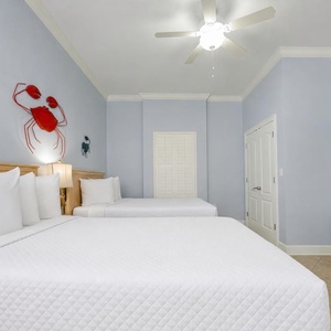 Relax in this guest suite with two queen beds and enjoy a good movie