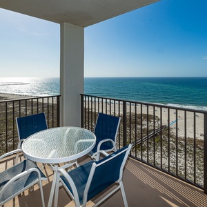 Feel the sun's sparkle on the gulf waters while you relax on your balcony seats around the glass table