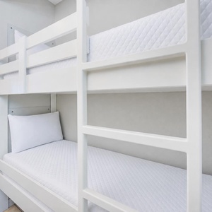 Cozy bunk bed area, perfect for kids, with easy access to the hallway and nearby living space
