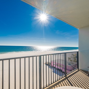 Bask in the sun while enjoying a stunning view from your beachfront east corner balcony, perfect for morning coffee