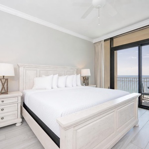 Retreat to the serene master suite with a king bed and sliding doors that open to inviting beach views and fresh gulf air