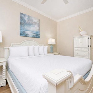 Drift into peaceful slumbers in this king guest suite, embraced by soft hues and warm lighting