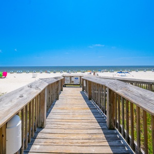 Make it a beach day with family and friends at Seaside Beach & Racquet, soaking up the sun and gentle waves