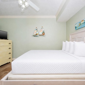 Drift into a restful night on a queen bed in the guest room, embraced by tranquil decor that offers a perfect retreat