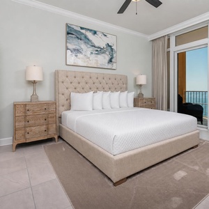 Relax in the king master suite with the sound of gentle waves from your beachfront balcony