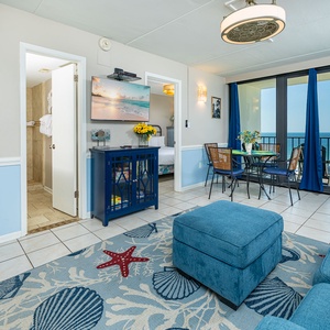 Relax in the inviting living area, where coastal decor enhances your enjoyment of time with family and friends