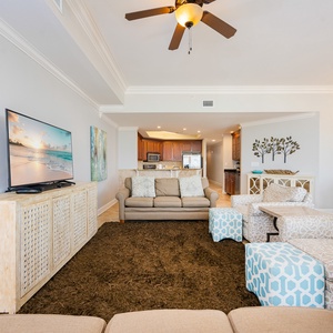 Immerse yourself in comfort on the plush couch, perfect for family movie nights after a day at the coast