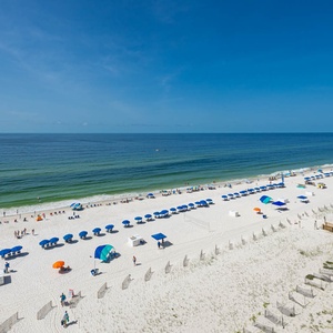 Enjoy the vibrant beach scene with a seemingly endless coastline and horizon, the perfect beach getaway