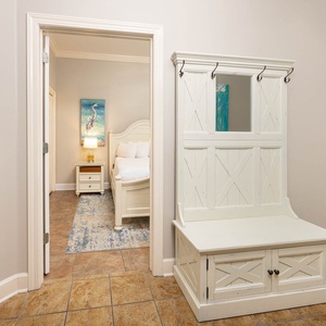 Step into a welcoming entryway, where your beach getaway begins with stylish decor and an inviting vibe