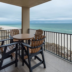 Savor your morning coffee at the outdoor seating, enjoying sweeping views of the tranquil waters and shoreline