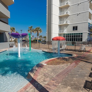 Seawind features a colorful splash pad with playful waterfalls, just steps from your beachside retreat in Gulf Shores