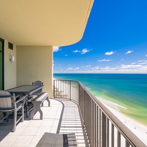 Savor refreshing breezes as you unwind at the table, enjoying breathtaking coastal views all around you