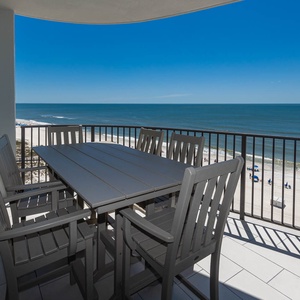 Enjoy a meal or morning coffee on the balcony with gentle waves and white sand as your surroundings for the day