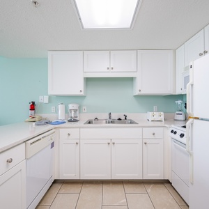 Discover a hotel kitchen that creates the perfect beach getaway with plenty of appliances and extras for convenience