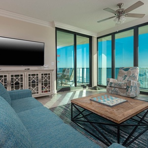 Relax on the comfortable seating featuring a sofa with queen sleeper while enjoying the expansive views or checkers game