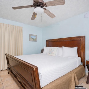 Relax on the bed in the king suite after a day exploring the coast and enjoy your quiet retreat
