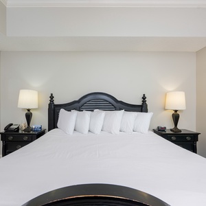 Unwind after a day at the beach in this elegant king master suite surrounded by stylish coastal accents