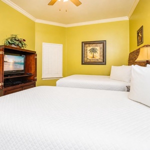 Unwind watching shows from the comfy queen bed's embrace in this cozy guest suite