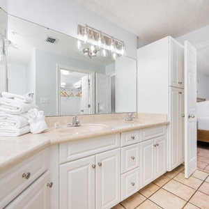 Refresh in the master bath after a day of adventure with a soothing jetted tub and relaxing walk-in shower