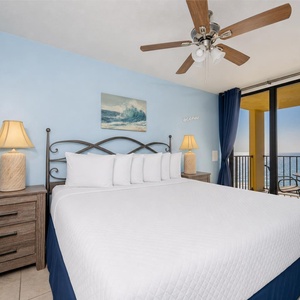 Relax on the king bed in the master while the quiet hum of the ceiling fan soothes you before beachside dreams
