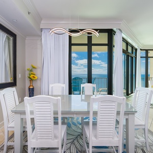 Gather around the dining table, enjoying lively conversations with loved ones as breathtaking views inspire relaxation