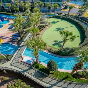 Immerse yourself in the tropical landscape while enjoying the refreshing pool and lazy river just outside your door