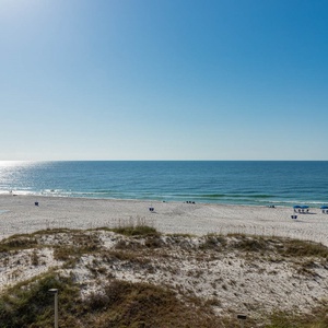 Enjoy stunning beachfront views from this inviting space, perfect for relaxation and unwinding by the sea