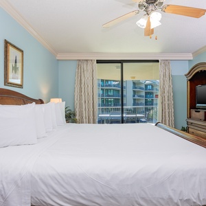 Unwind after a fun vacation day and stream your favorite shows in the king master suite with balcony access