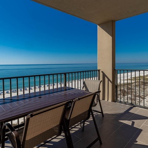 Relax on the beachfront balcony with expansive views of the coastline that are seemingly endless