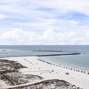 Enjoy breathtaking coastal views from your balcony, where you can relax and soak in the tranquil beach vibe