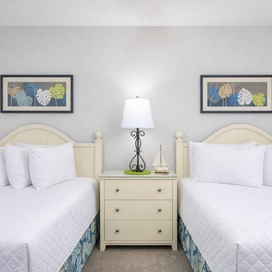 Drift into restful nights on plush double beds in the guest suite, surrounded by soothing decor and inviting natural light
