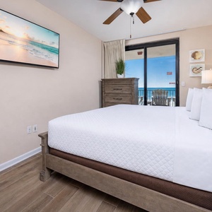 Fresh coastal air drifts through your balcony as you settle into the master suite with king bed and wall TV